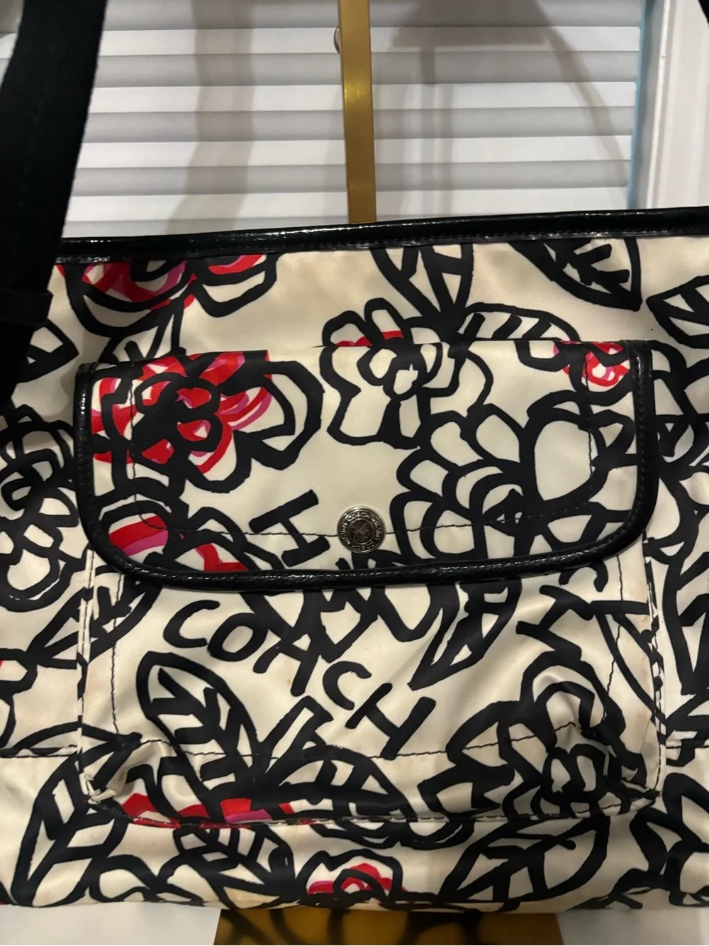 Coach Cream Canvas Crossbody with Black Floral Outline and Red Accents